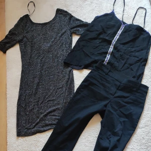 Fest kläder till helgen  - Snygg tunn taight klänning i stl S/ M skimrar i silver.  Finbyxa med resår i midjan stl 36 Linne finns på separat annons .  75 kr styck  Kan skickas om köparen betalar frakt  Fint skick .  