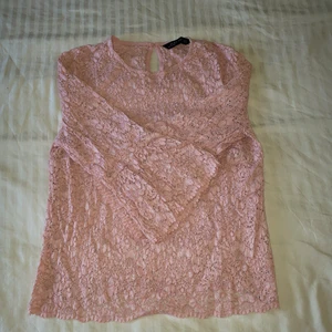 Rosa topp - Fin somrig rosa topp med vida ärmar.