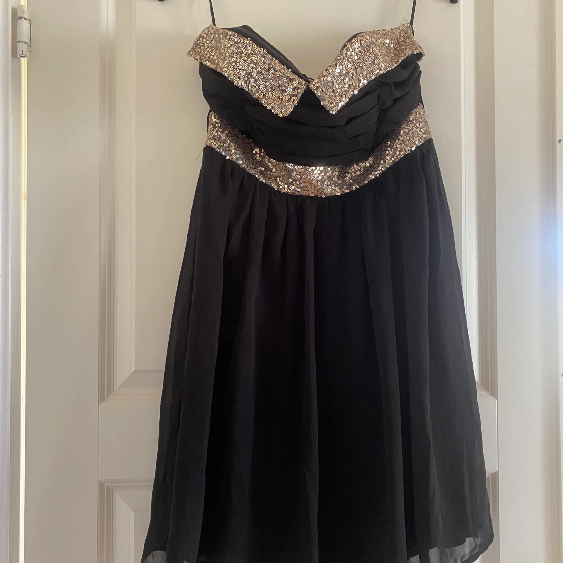 Ärmlös fest klänning