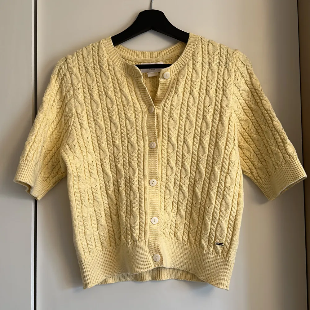 Cute yellow sweater for you! I bought it from Lindex few months ago, only wore it two times. It is nearly new. It has very soft touch and friendly to skin. You can wear it and feel warm enough indoors in winter season. . Stickat.