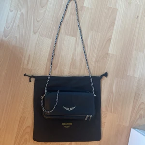 Zandig och Voltaire väska - Intressekoll på min zandig och Voltaire väska som jag fick i födelsedagspresent. Ser helt ny ut. Dustbag och två band tillkommer.