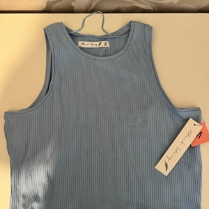 Blå topp från Gekås - En fin blå topp från Gekås i storlek M. Ångrade köpet och den kostade 60kr.