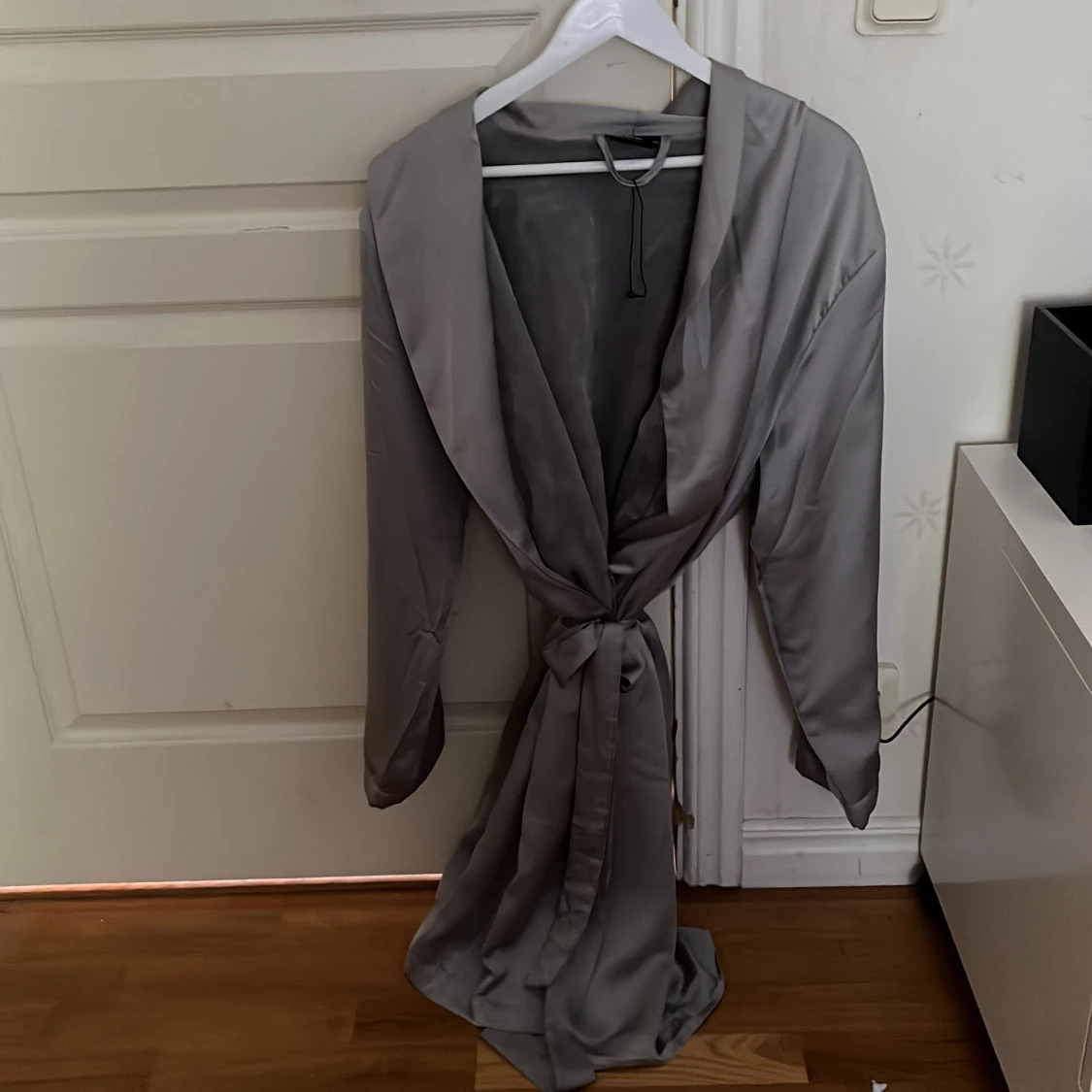 En supermysig morgonrock i siden och med teddyfleece inuti! 