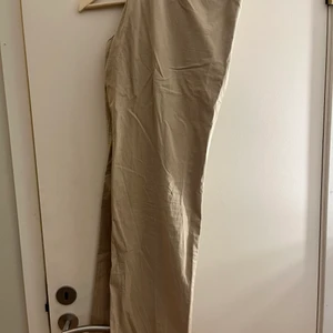 Kostymbyxor  - Fina beiga kostymbyxor, herrmodell