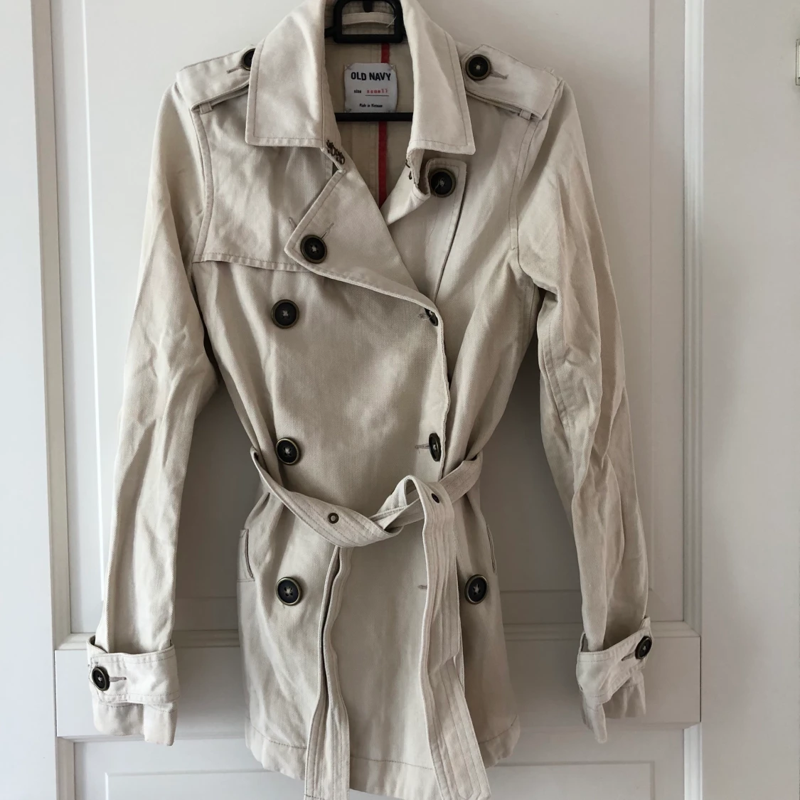 Beige höstkappa (xs)