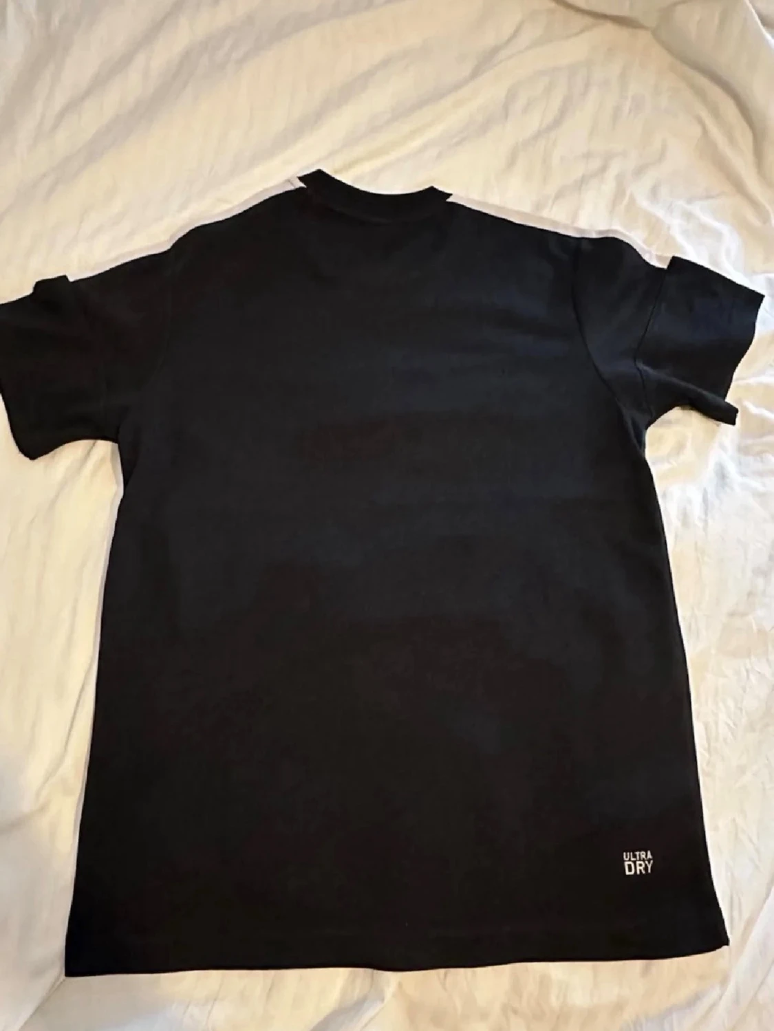 Svart t-shirt med grön rand Lacoste - 1