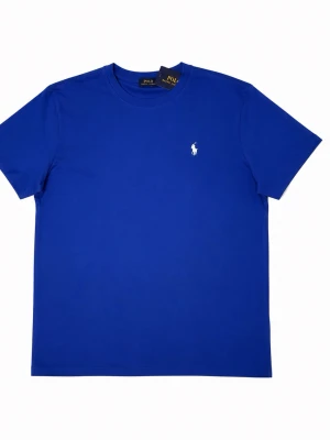 Blå t-shirt från Polo Ralph Lauren  LARGE - Klassisk blå t-shirt från Polo Ralph Lauren med den ikoniska vita logon broderad på bröstet. T-shirten har rund halsringning och korta ärmar. Tillverkad i mjuk bomull för en skön känsla och enkel stil.