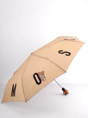 Moschino beige umbrella 🤎 - New with tags attached original beige Moschino umbrella featuring an automatic open-and-close mechanism. Original price 95€. Handle material: plastic • Fabric material: 100% polyester • Length: 48 cm • Diameter: 99 cm
