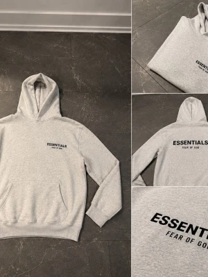 Mysig essentials hoodie  - Snygg och stilren Essentials-tröja i grått. Passar perfekt till både vardags och streetwear outfits.