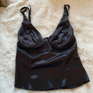 Svart korsett topp - Aldrig använd, köpt second hand. Sitter som en B kupa