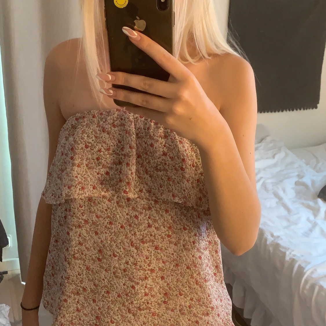 Blommig ärmlös blus strl xs