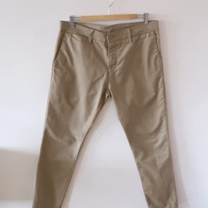 Carhartt WIP Sid Pant beige - Storlek 34/34, använd men fortfarande i bra skick