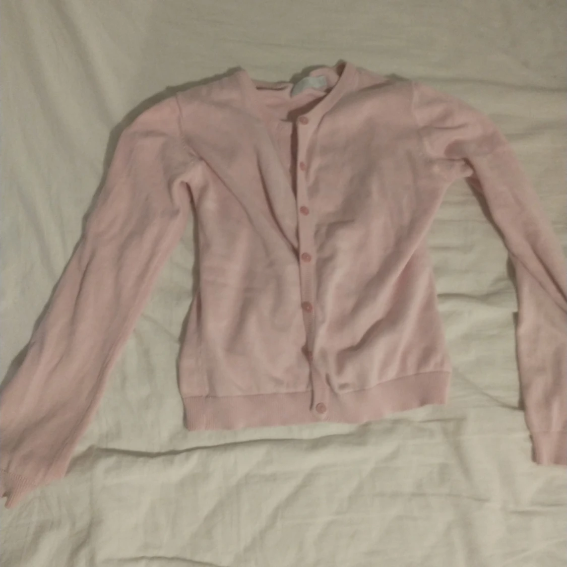 En rosa kofta köpt secondhand - 90