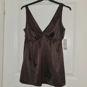 Linne  - Endast testad, prislapp finns kvar. Den är från gina tricot. Vill ni ha varan skickad blir det + 66kr spårbar frakt. 