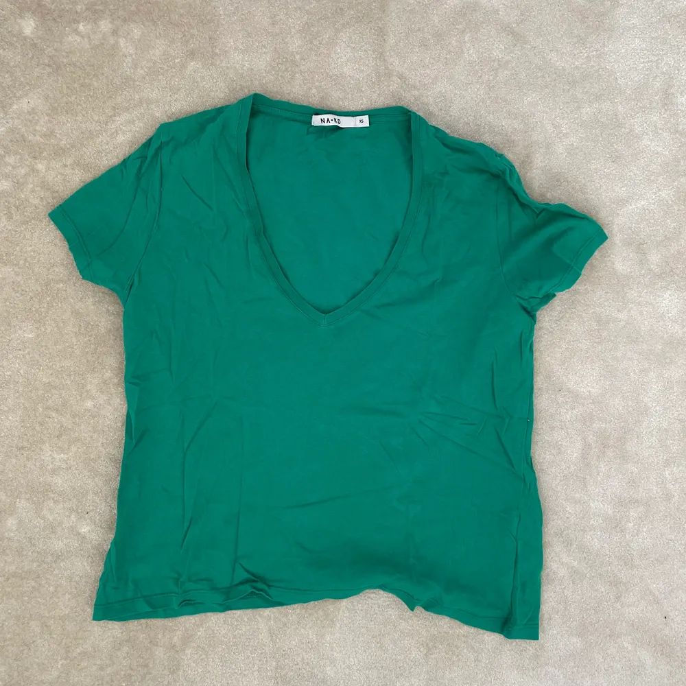Jättefin grön T-shirt! Älskar färgen 😍. T-shirts.