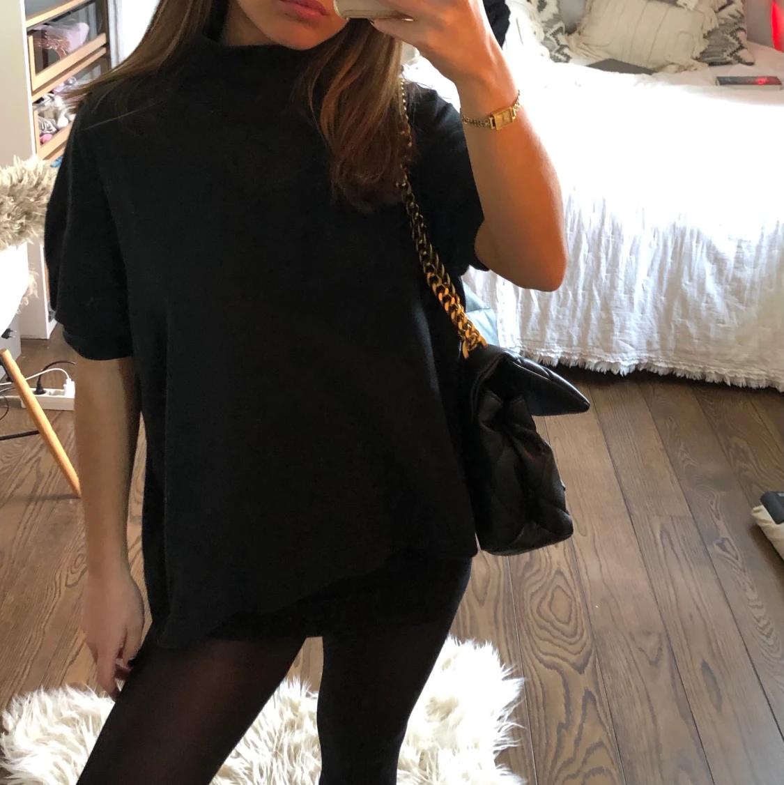 Svart kortärmad polotröja