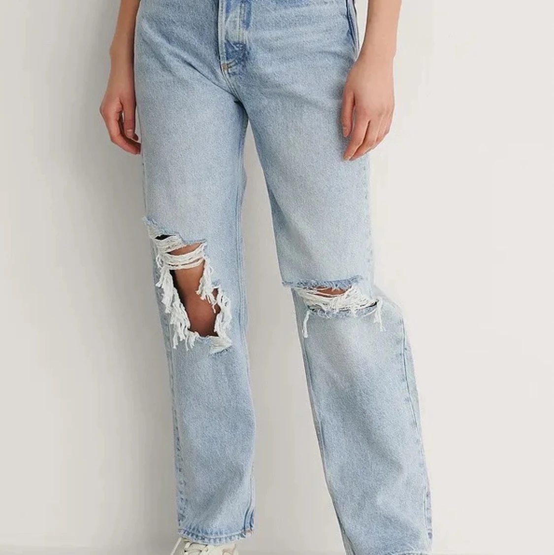 Jeans med slitningar