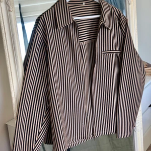 Randig jacka strl L - Unisex 