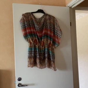 Klänning  - Den är aldrig använda 