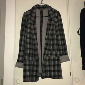 Suit jacket  - Suit jacket in thick soft material (polyester + elastane) very casual and warm. In various shaded of grey. Size is L/UK 12 but fits an M/UK 10 nicely also!