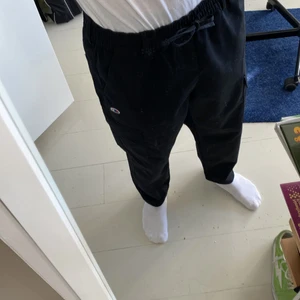 Champion cargos - Black champion cargos. Used maybe 3 times so they are in excellent kondition. New price is twice the cost of what im selling them for.