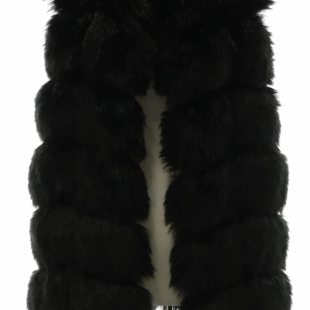 Snygg pälsväst faux fur som ny. Jackor.