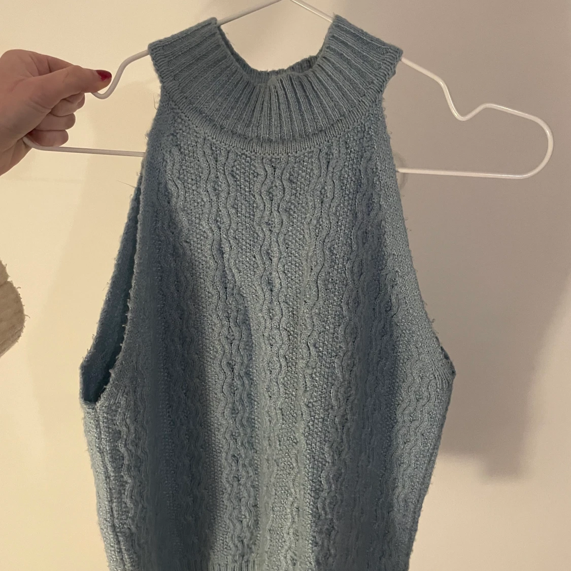 Blå stickad väst  - 91