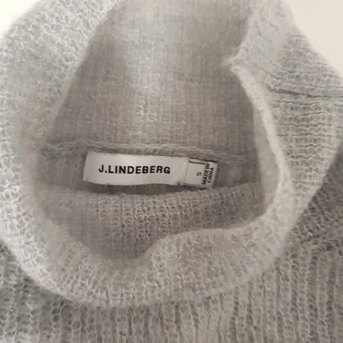Stickad tröja från J.Lindeberg  - 91