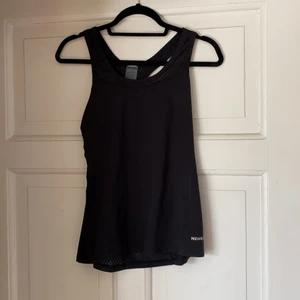 Träningslinne - Helt oanvänt linne. Köparen betalar frakten.