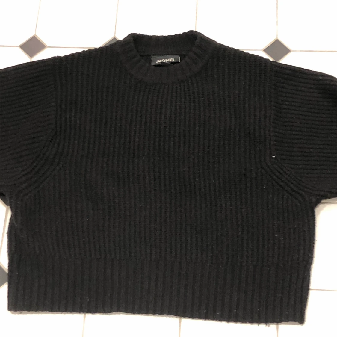 Stickad svart tröja.  - 90