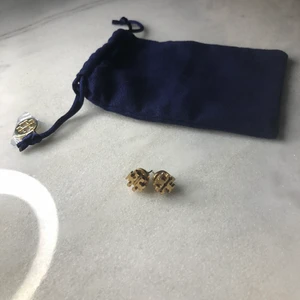 Tory Burch Gold Earrings - Very cute, very fancy Tony Burch earrings. Worn only twice, won’t be needing them anymore since I’ve received similar ones on my birthday. They come in a cute little TB bag. 