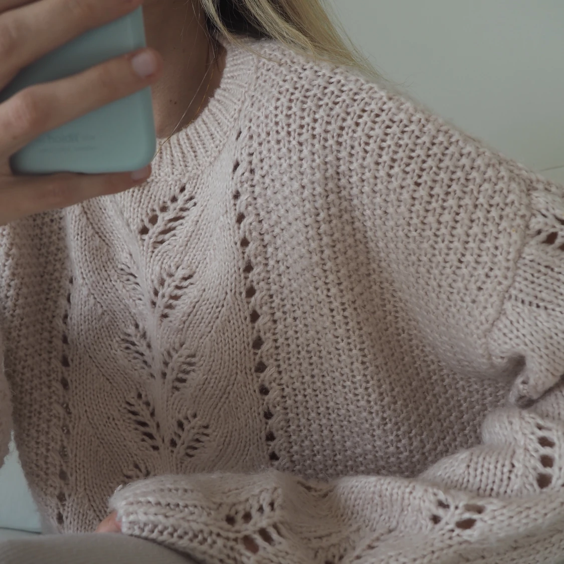 Pastellrosa stickad tröja