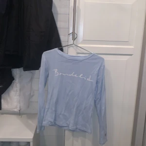 Tröja från bondelid  - Ljusblå bondelie tröja, sällan använd