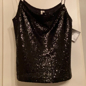 Paljettlinne - Svart paljettlinne perfekt inför nyår!! Enbart testat men lappar och allt kvar! Köpare står för frakt!