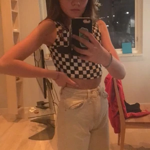 En svart vit linne  - Använd få gånger skönt material 