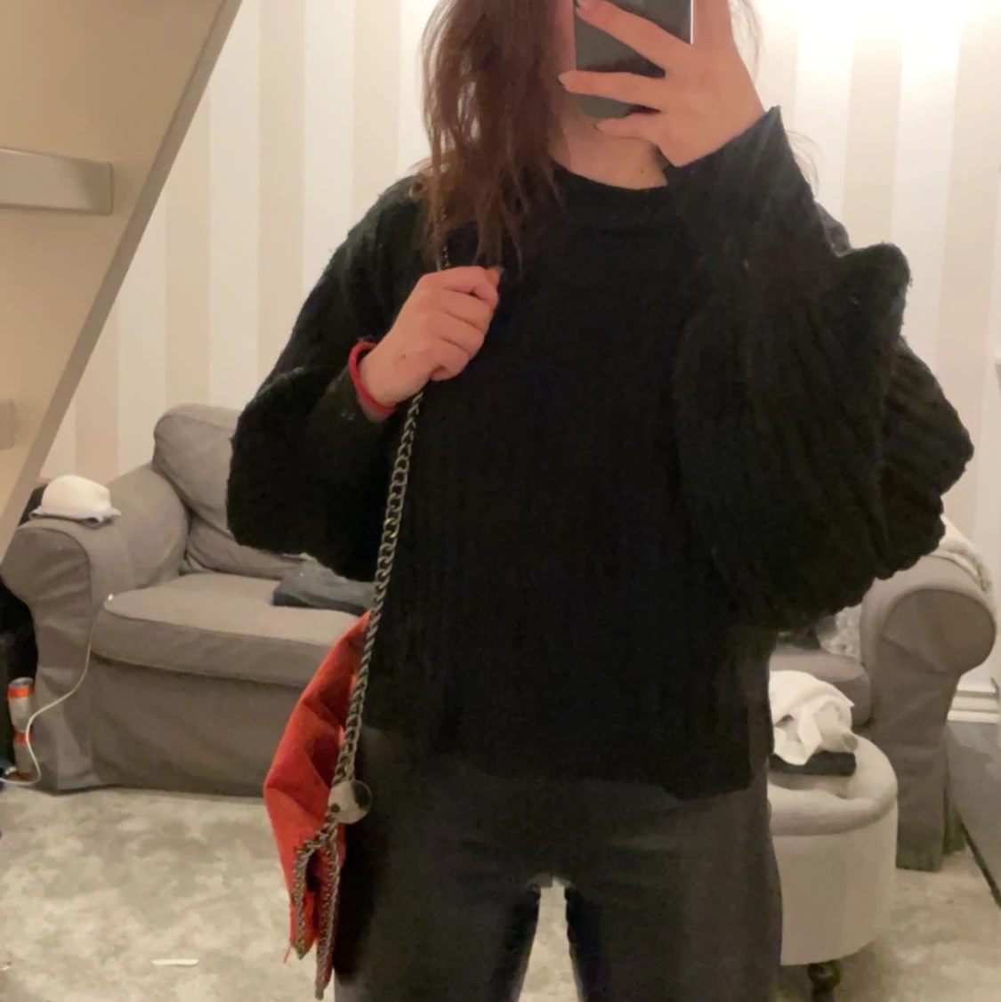 Svart stickad tröja