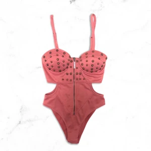 Beyonce house of dereon body  - beyonce’s märke house of dereon body, Bustier. Reglerbara axelband.   Öppnas och stängs med knappar nertill.  Storlek- XXS- XS  Skick- mycket bra