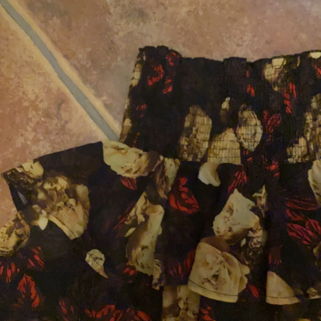 Volangkjol från NAKD, blommönster S-M - 90