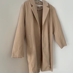 Kappa från Nelly  - Kappa från Nelly, storlek 40. Aldrig använd 180kr