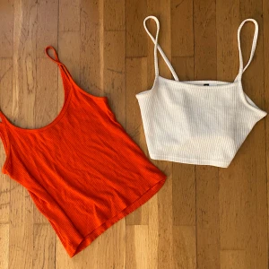 2st topp - 2 fina toppar, ena är orange och andra är kortare i vit😍! 🧡🤍