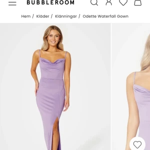 Klänning - Somrig långklänning i ljuslila med öppen rygg och slits vid ena benet.  Storlek S. Aldrig använd ( se prislapp kvar på plagg)