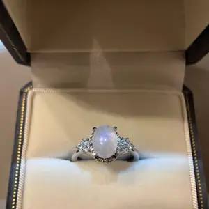 Nature Genuine Moonstone, S925 silver ring with tag on it, small zircons decorated, brand new, with jewellery bag provided, ring size is adjustable 