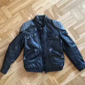 Never worn motorcycle jacket from Montreal brand Angora, size is S-M new price was 1999KR