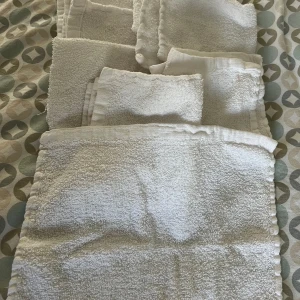 Tvättlappar  - 10 stycken vita tvättlappar. 