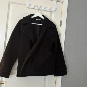 kappa - En kappa från design by si säljer då jag har en likadan, står ej storlek men passar som en s