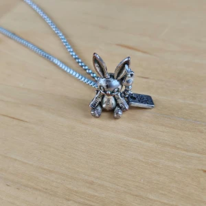 Kaninhalsband - Halsband med kaninberlock som har oxiderat lite.