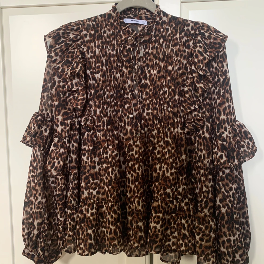 Leopard blus