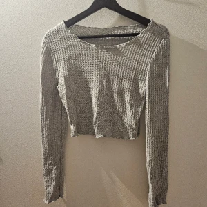 Grå tröja  - Grå trlja