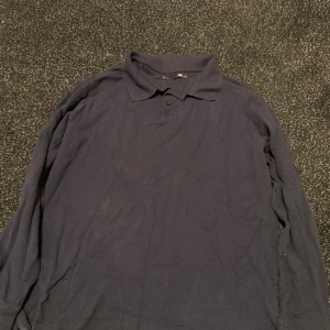 Långarmad skjorta - Strl M