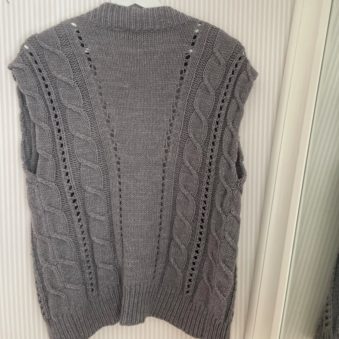 Stickad väst  - 93